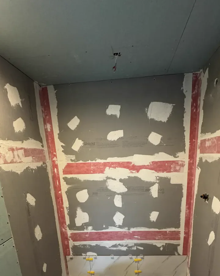 Shower walls with the waterproofing membrane and every seam banded, Tampa, FL bathroom remodel