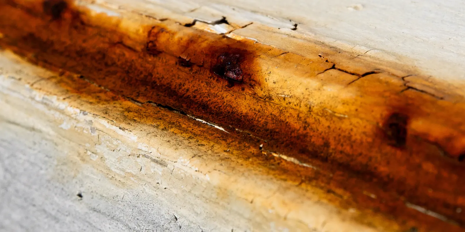 Close up of a rusty cracked enamel surface, bathtub reglazing