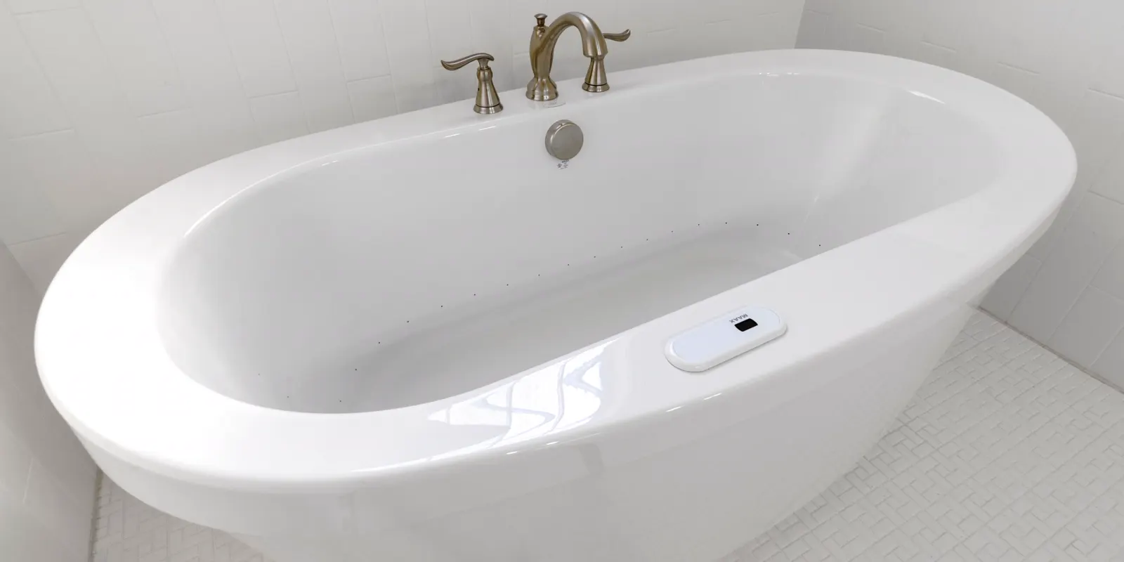 A clean and empty white bathtub set in place, bathtub replacement