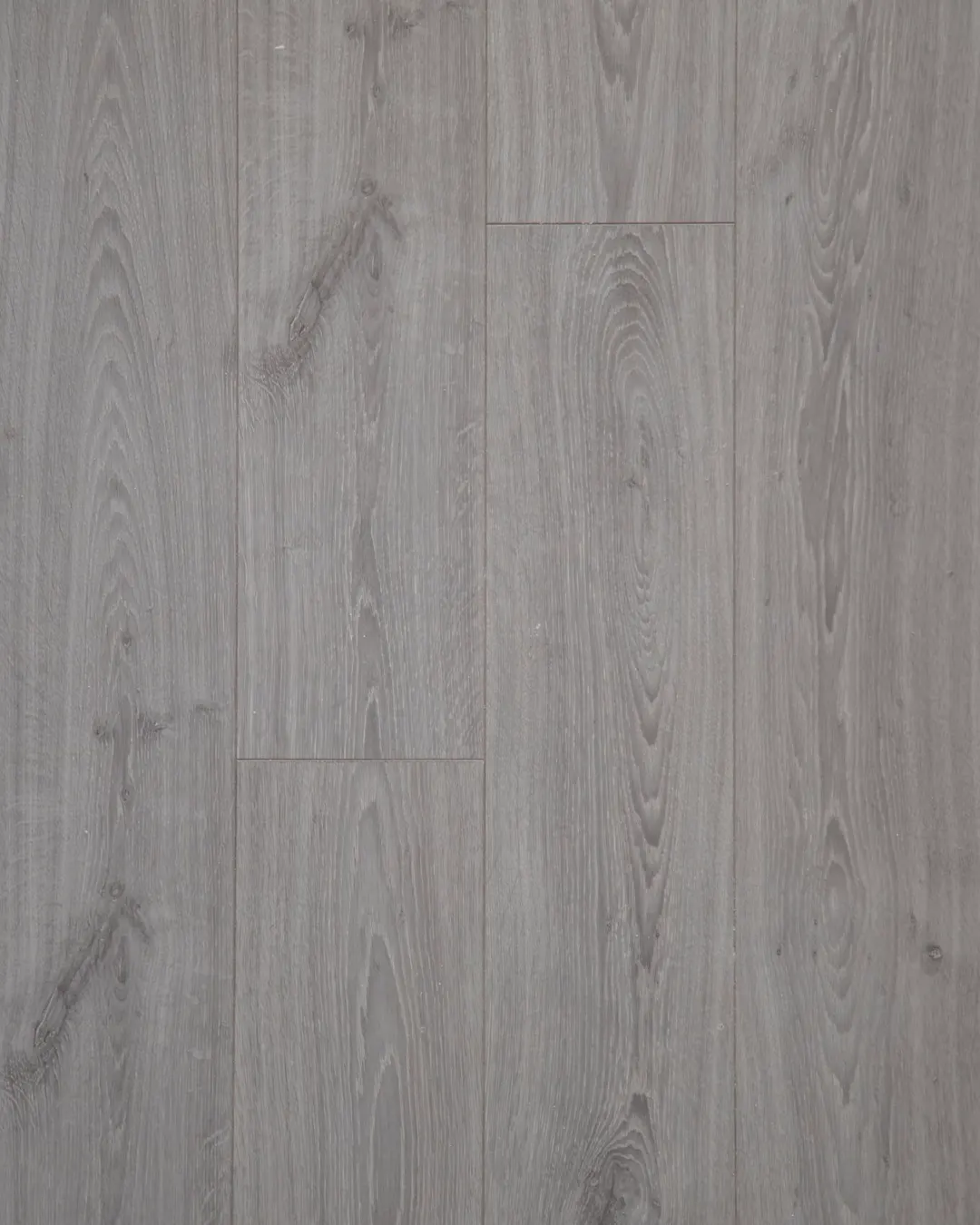 Close up of gray vinyl plank flooring boards, luxury vinyl plank flooring