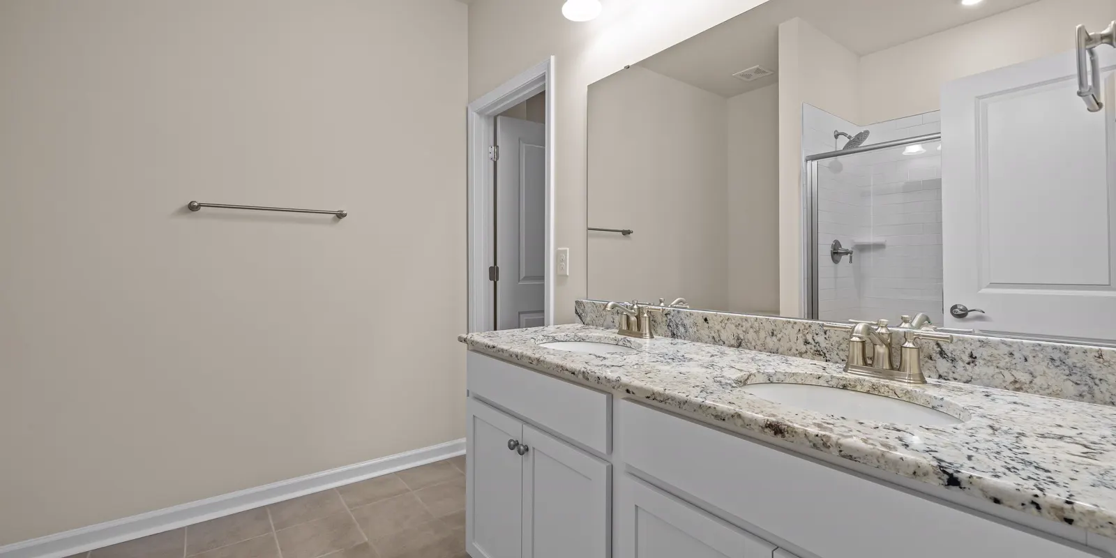A master bathroom with a double vanity and two mirrors, master bathroom remodel