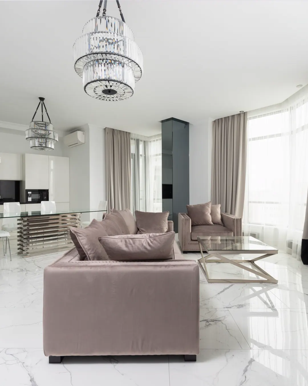 A bright room with a white marble look tile floor, tile flooring installation